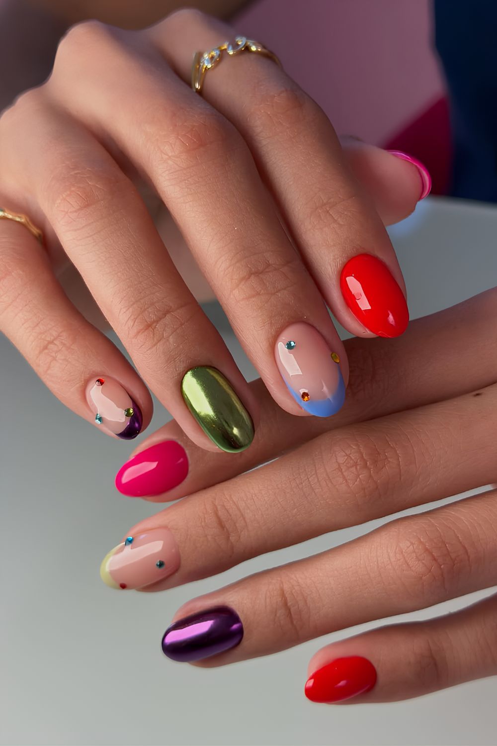 Colorful mismatched nails with rhinestones