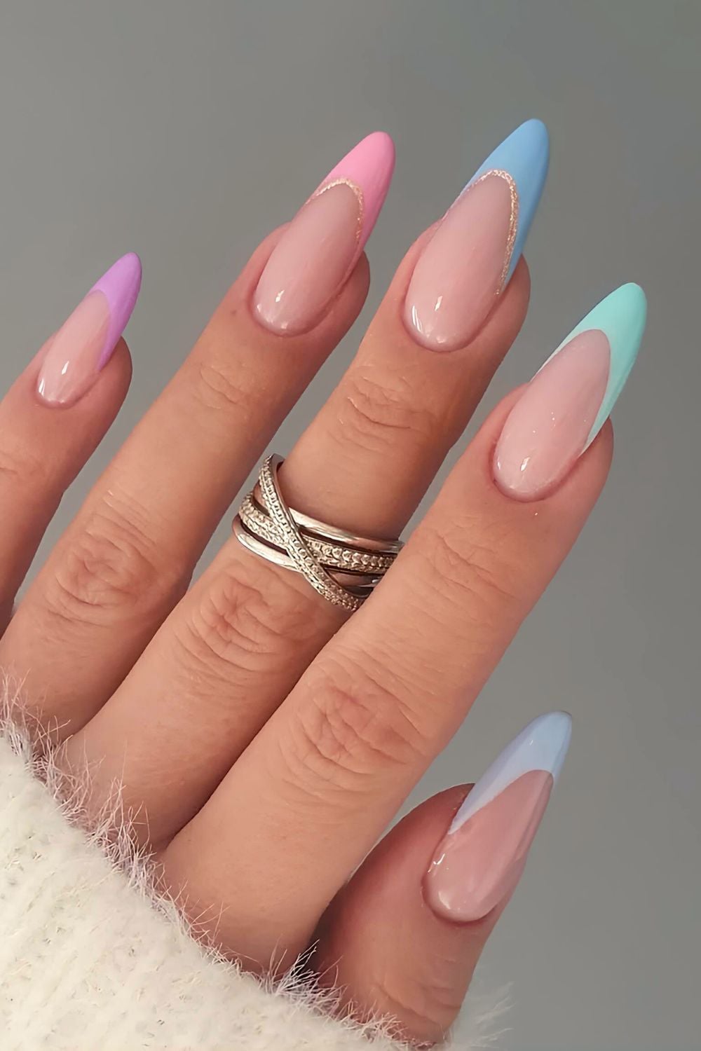 Colorful pastel French with glitter-edged tip accents