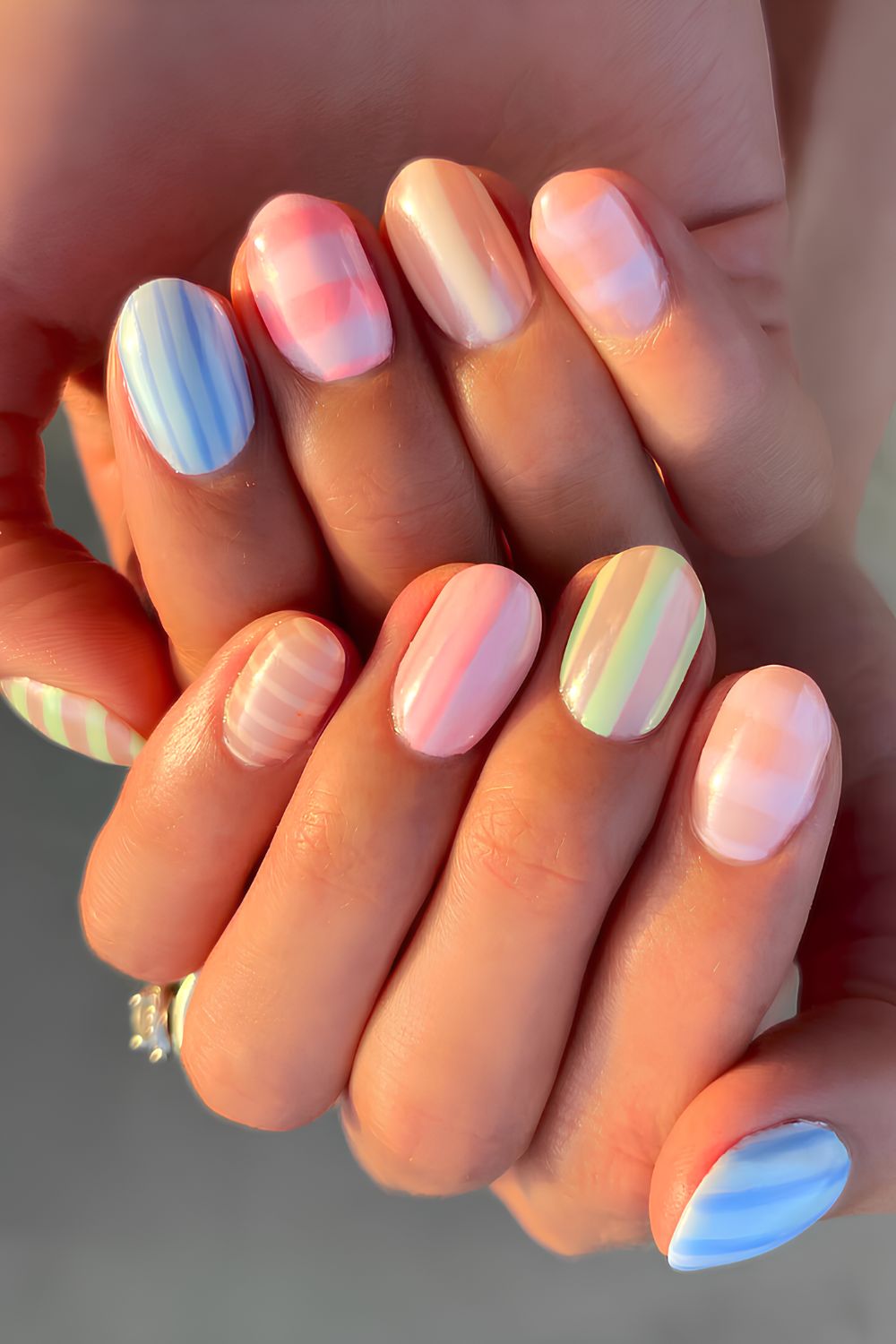 Colorful pastel nails with stripes