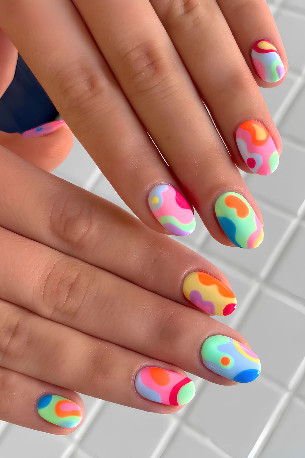 Colorful swirly nails with dots