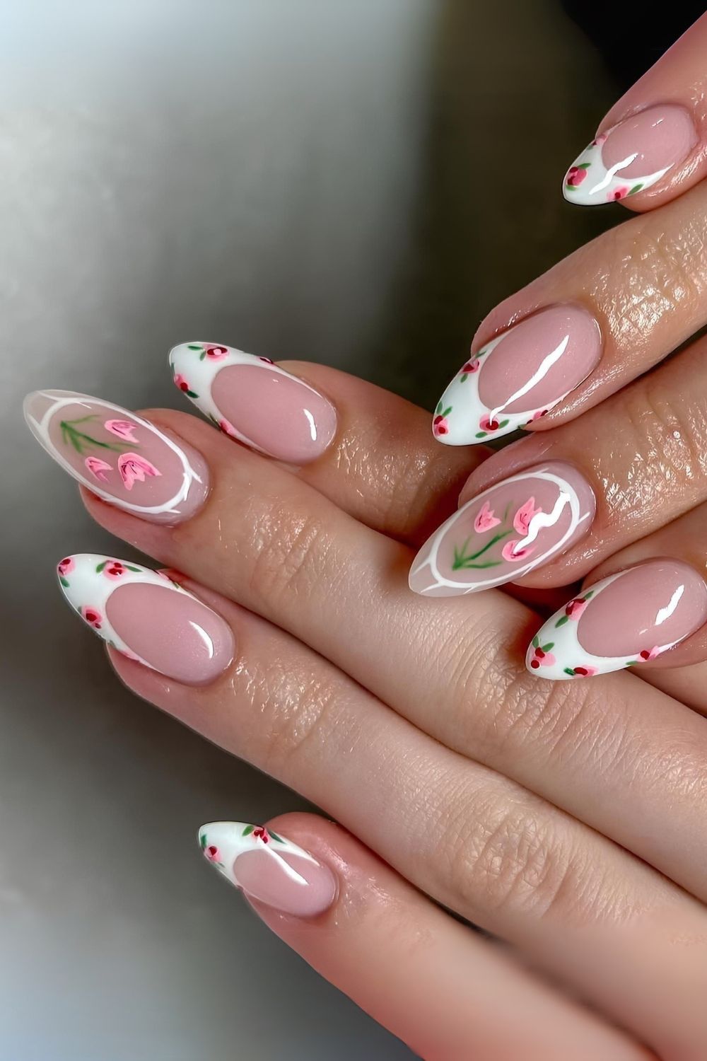Coquette French tips with tiny roses and accent nails with tulips