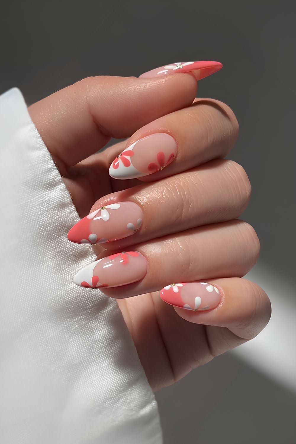 Coral and white floral french nails