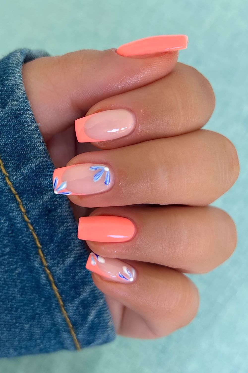 Coral peach solid and french nails with denim blue flowers