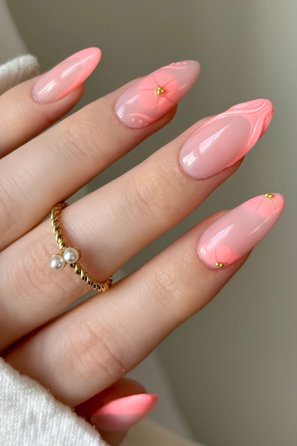 Coral pink French mani with blooming flowers