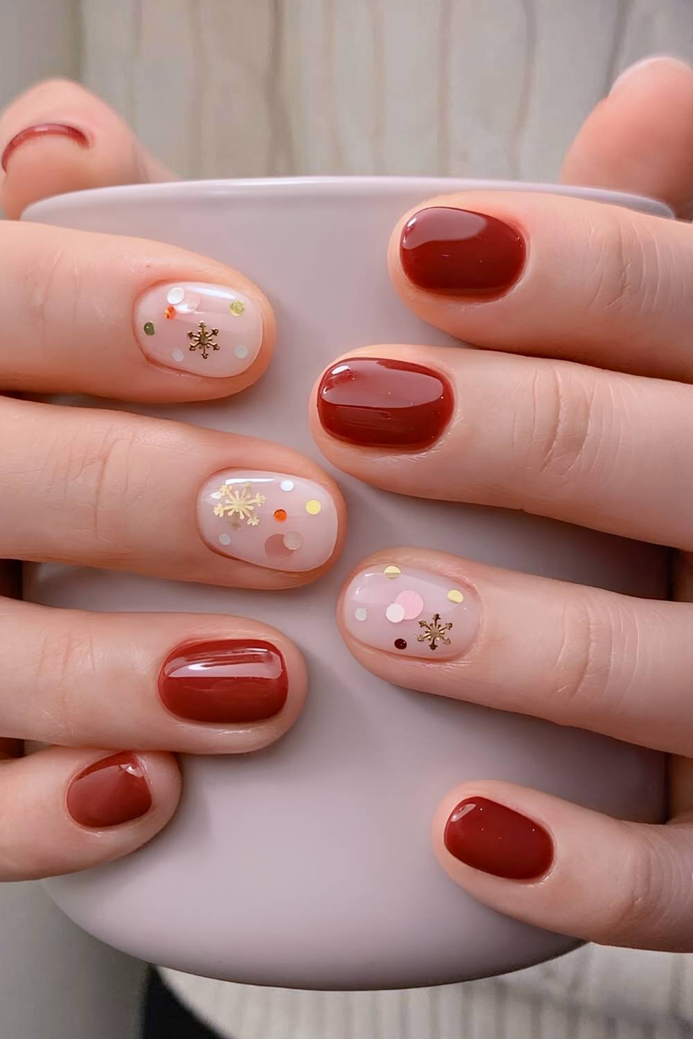 Cranberry red and white nails with snowflakes