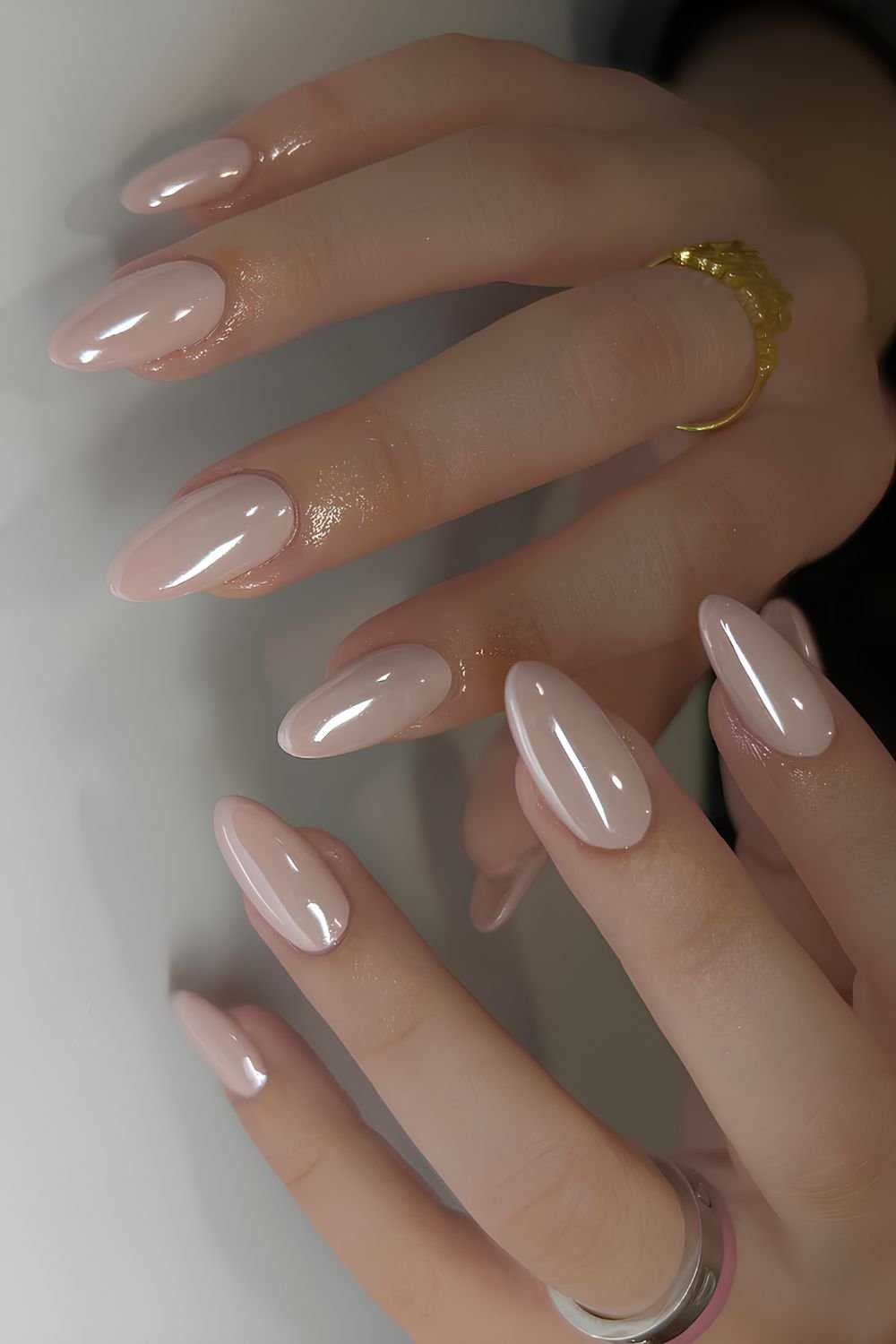 Creamy almond chrome nails