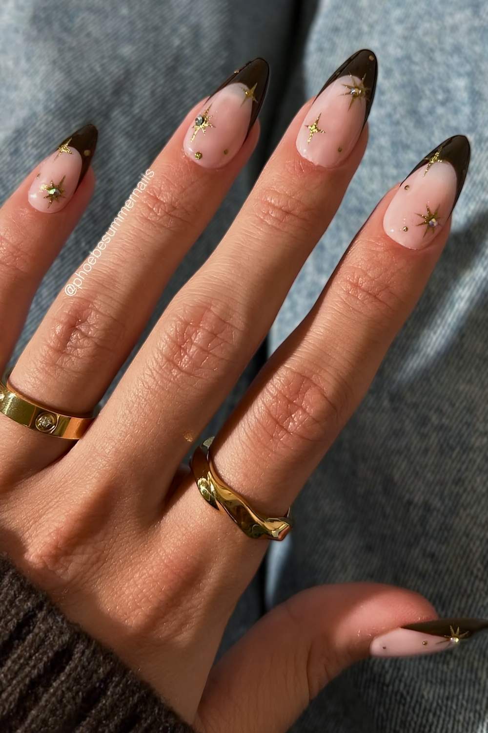 Dark brown French mani with gold celestial art
