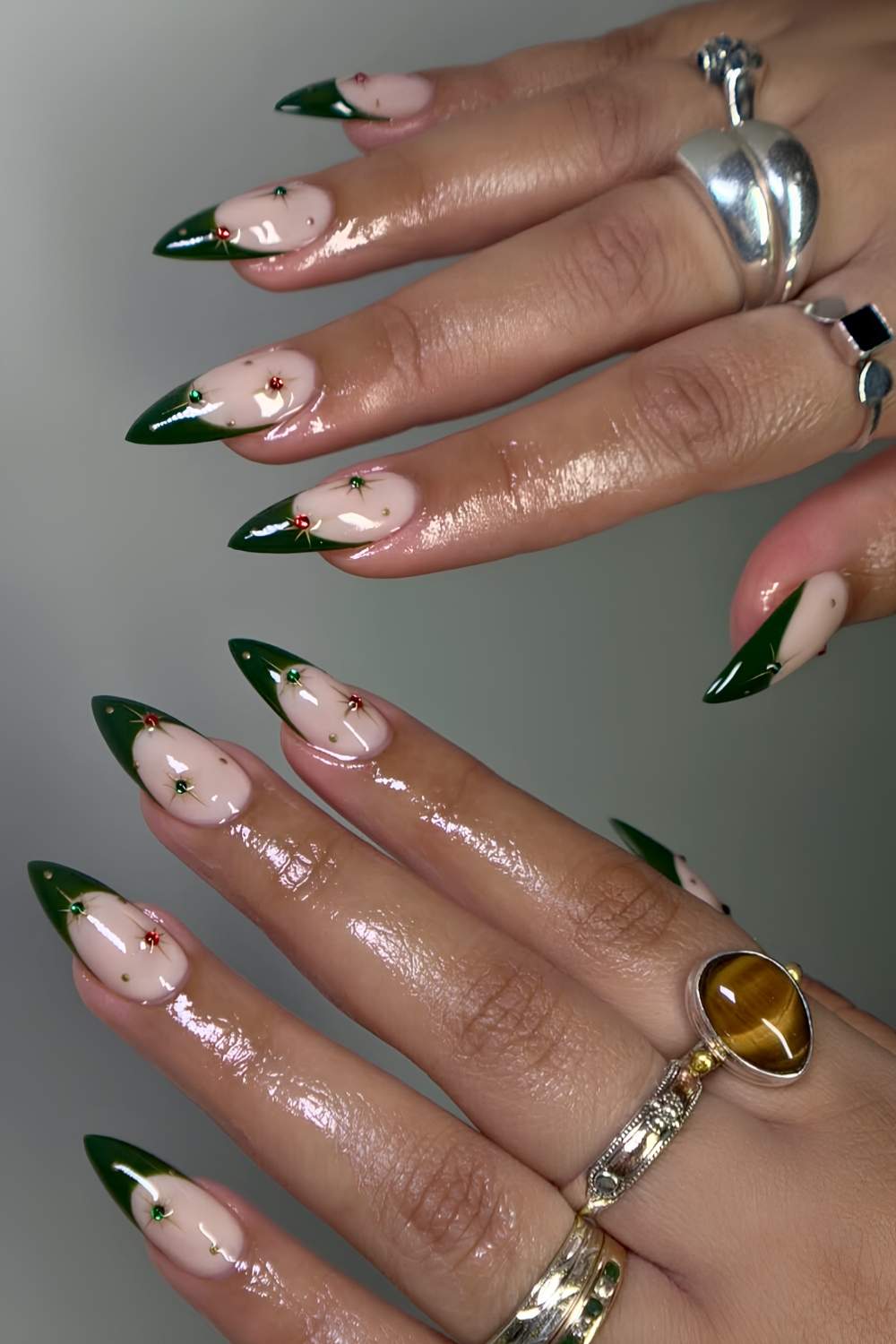 Dark green French mani with colorful gems