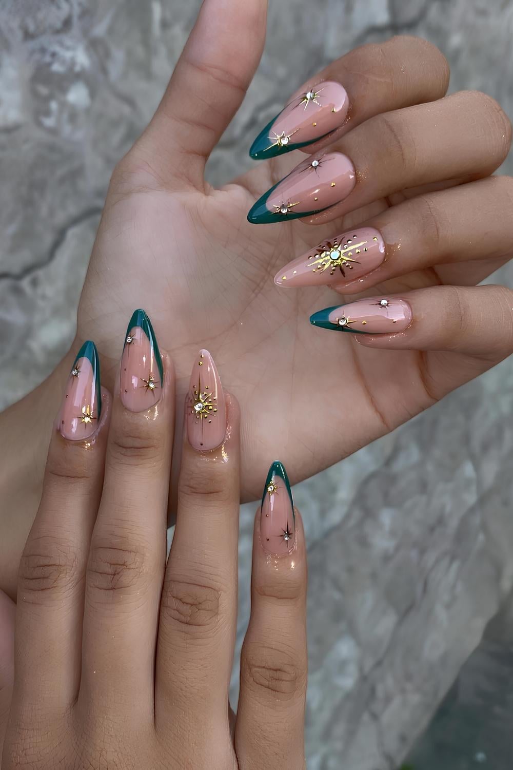 Dark green French nails with gold stars