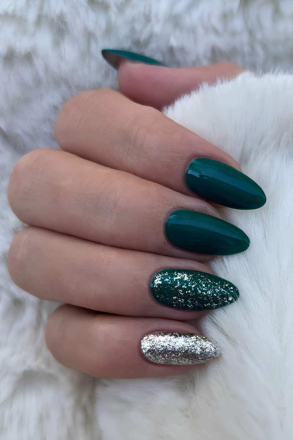 Dark green manicure with silver glitter