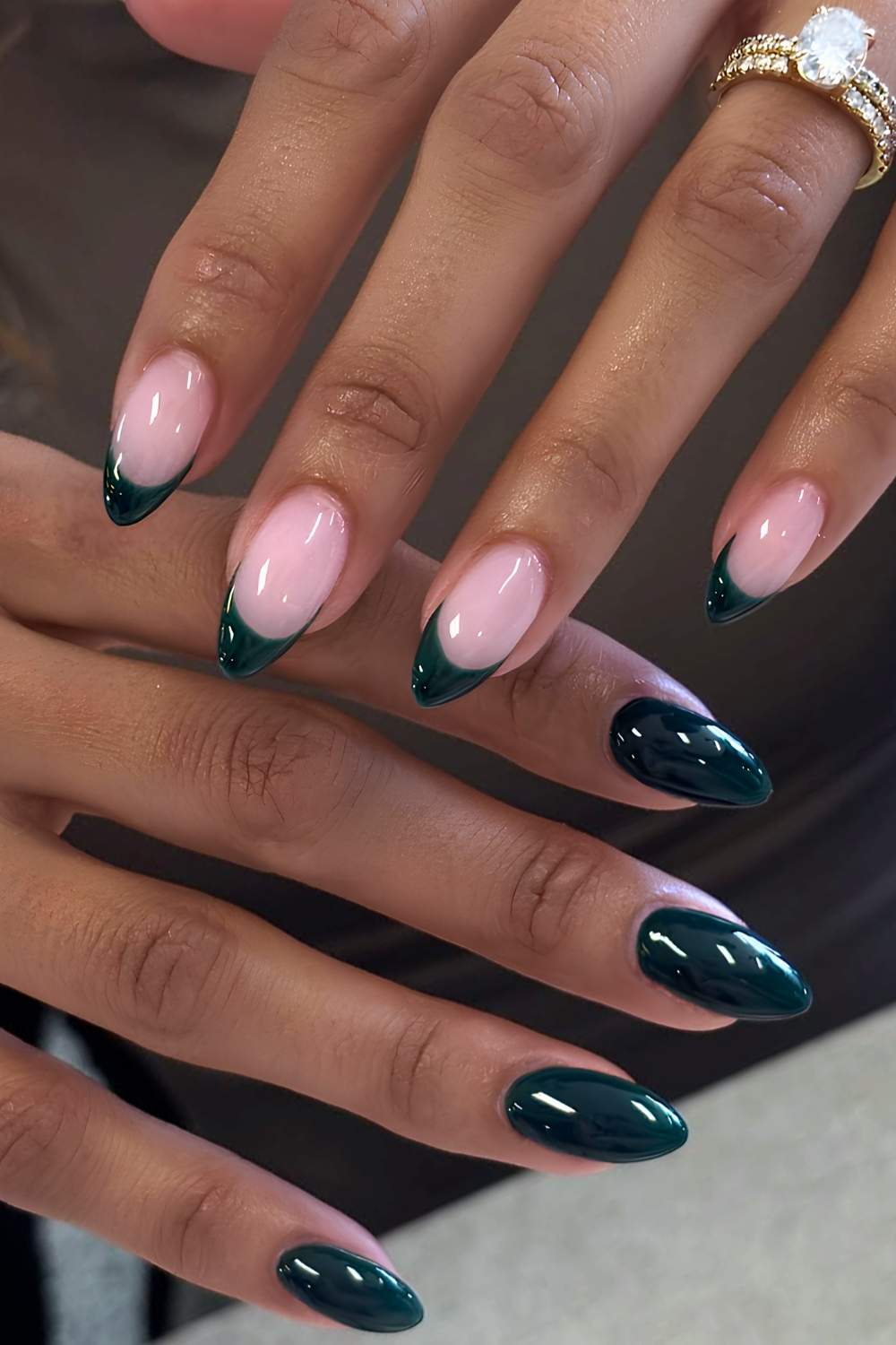 Dark green nails with accent French tips