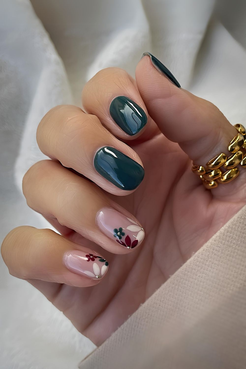Dark green nails with floral art