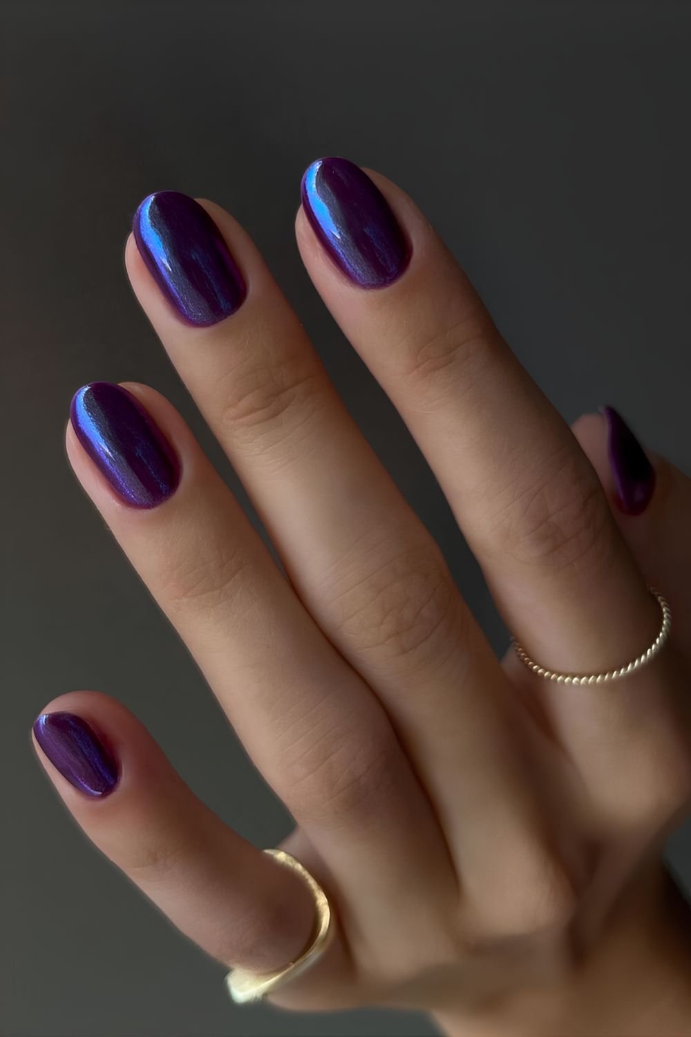 Dark purple chrome manicure