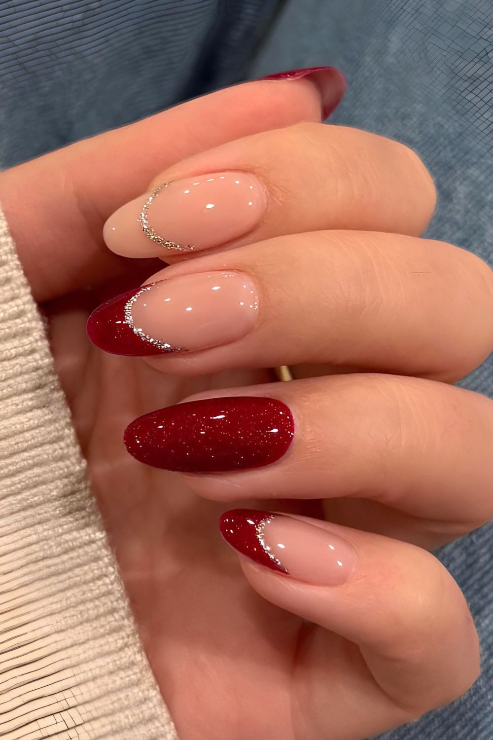 Dark red and beige glitter nails with outline tip accents