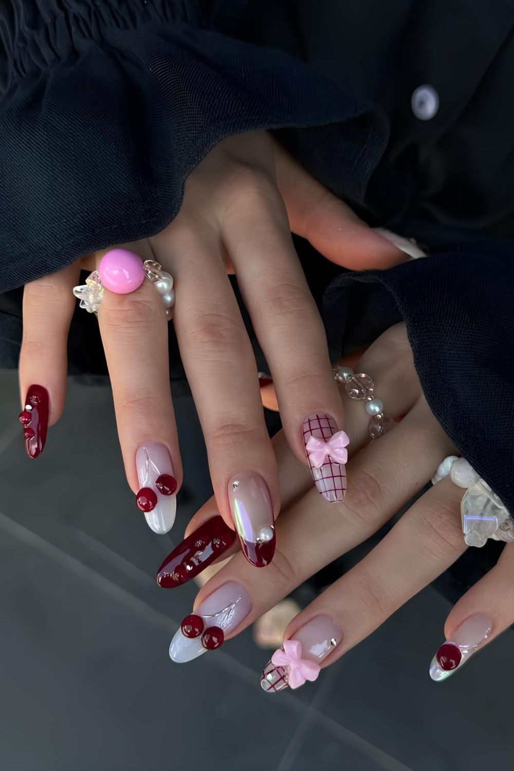 Dark red nails with 3d design accents