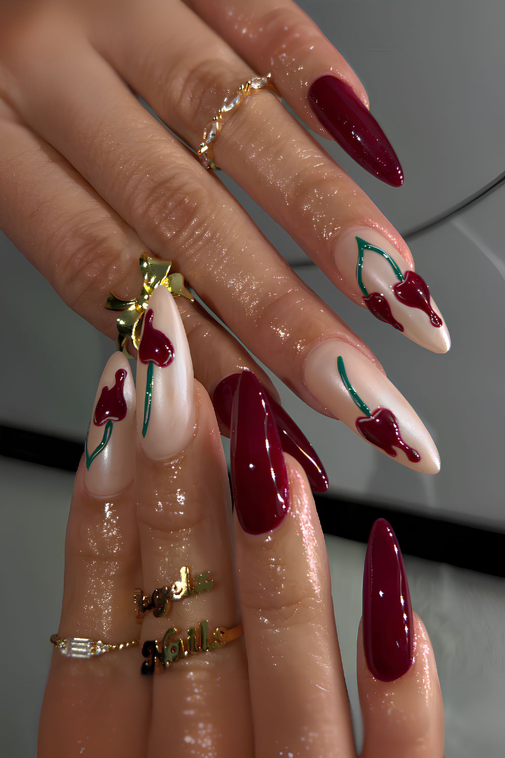 Dark red nails with cherry drip art