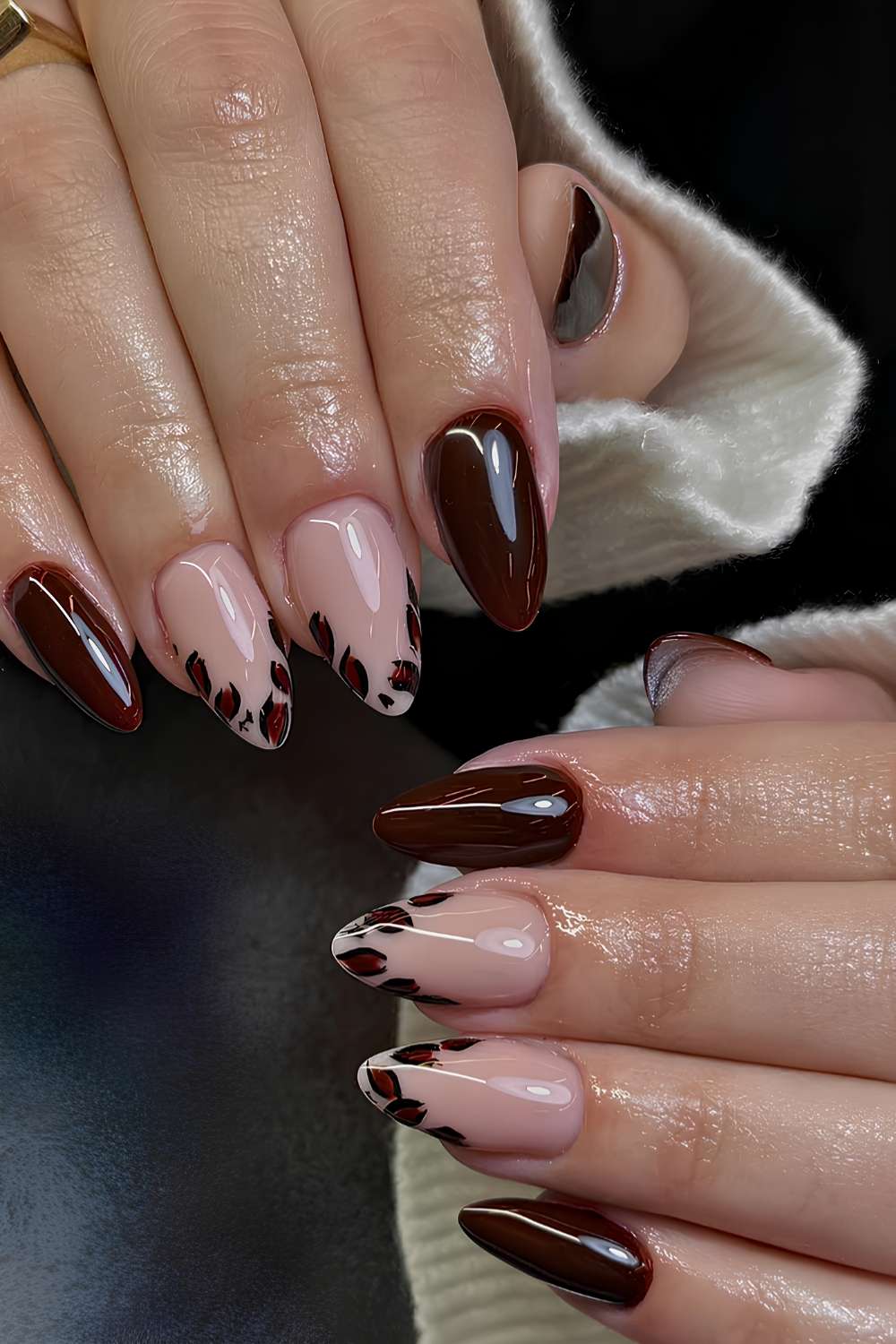 Dark red nails with leopard print