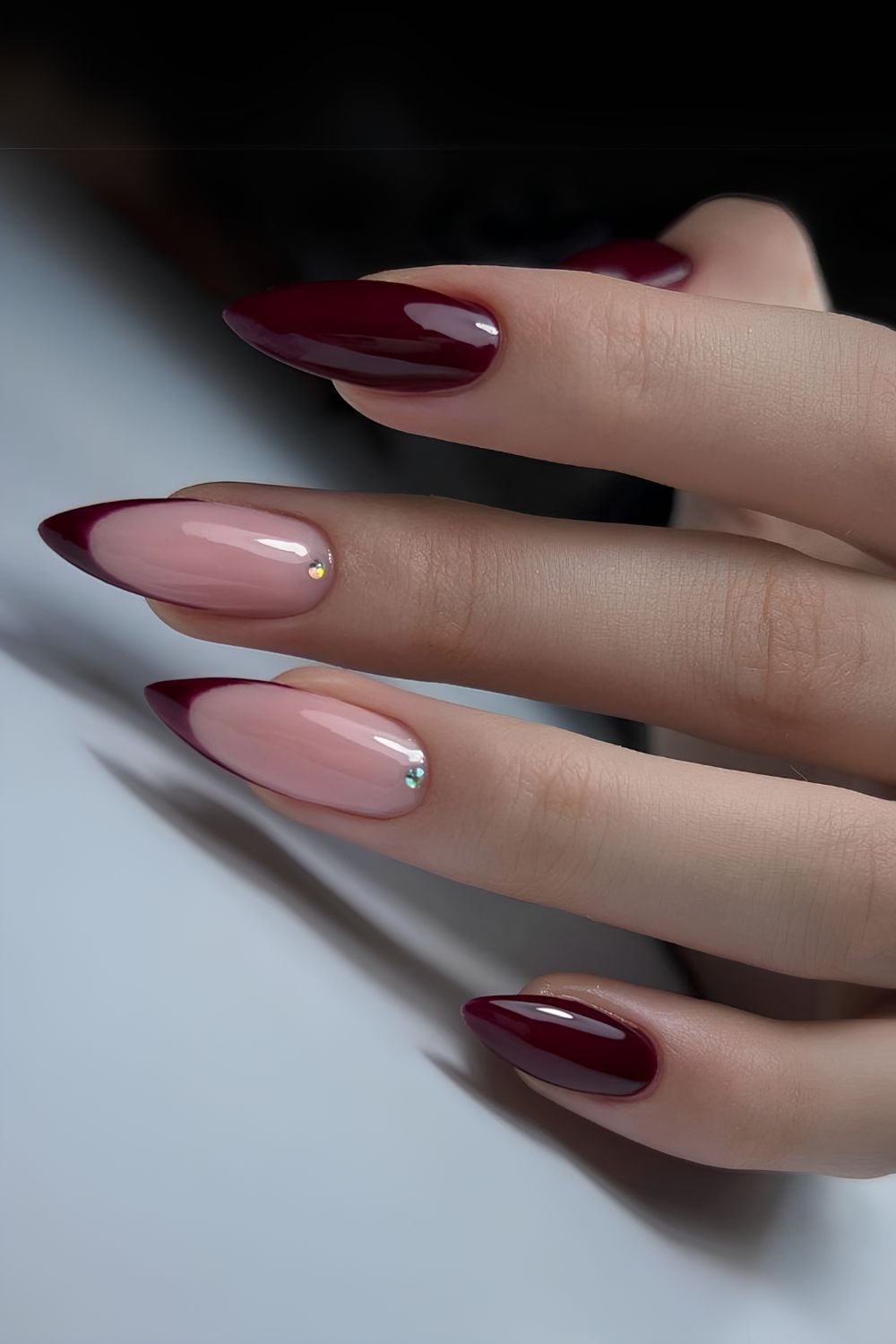 Deeep burgundy mani with rhinestones