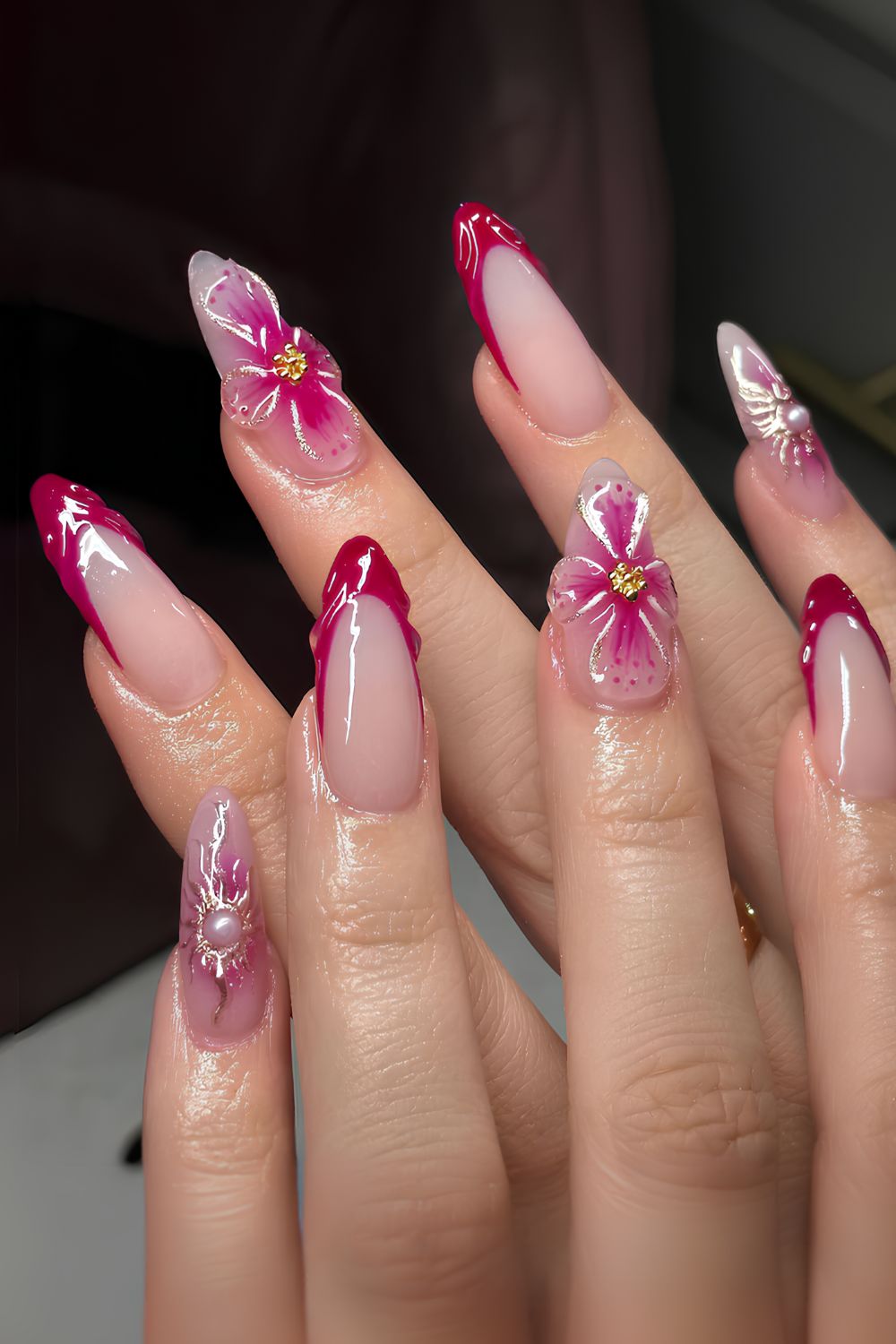 Deep pink French mani with textured flowers