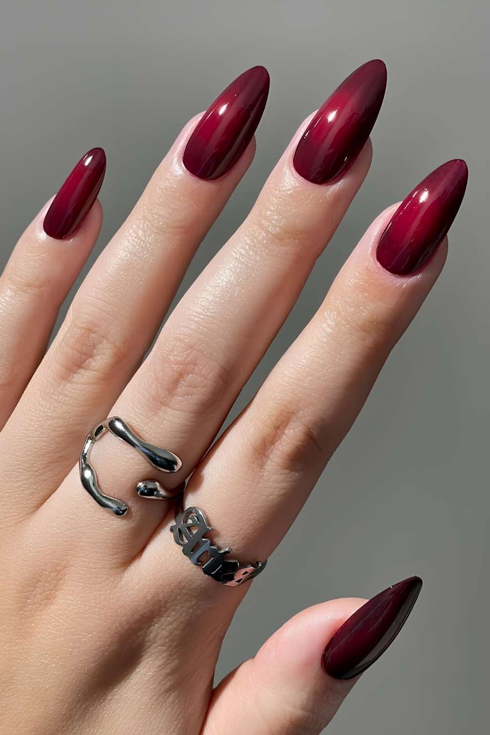 Deep red aura manicure