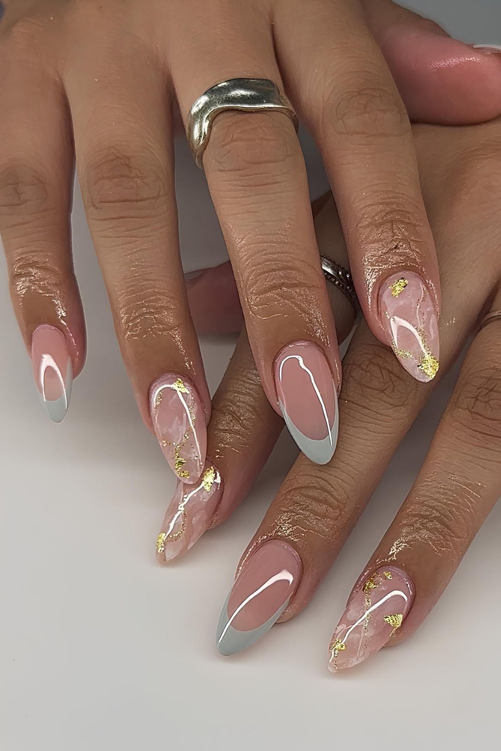 Dual style nails light blue french tips and white marble effect nails with gold details