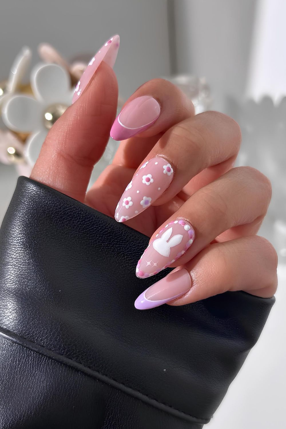 Easter nails with pink mauve, white and purple designs