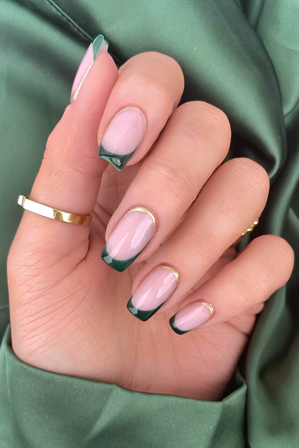 Emerald green French nails with gold details