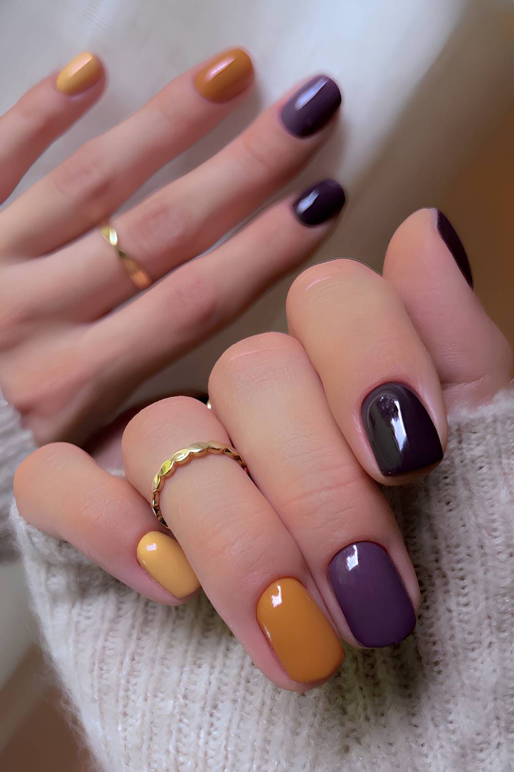 Fall skittle mani in purple and mustard yellow tones