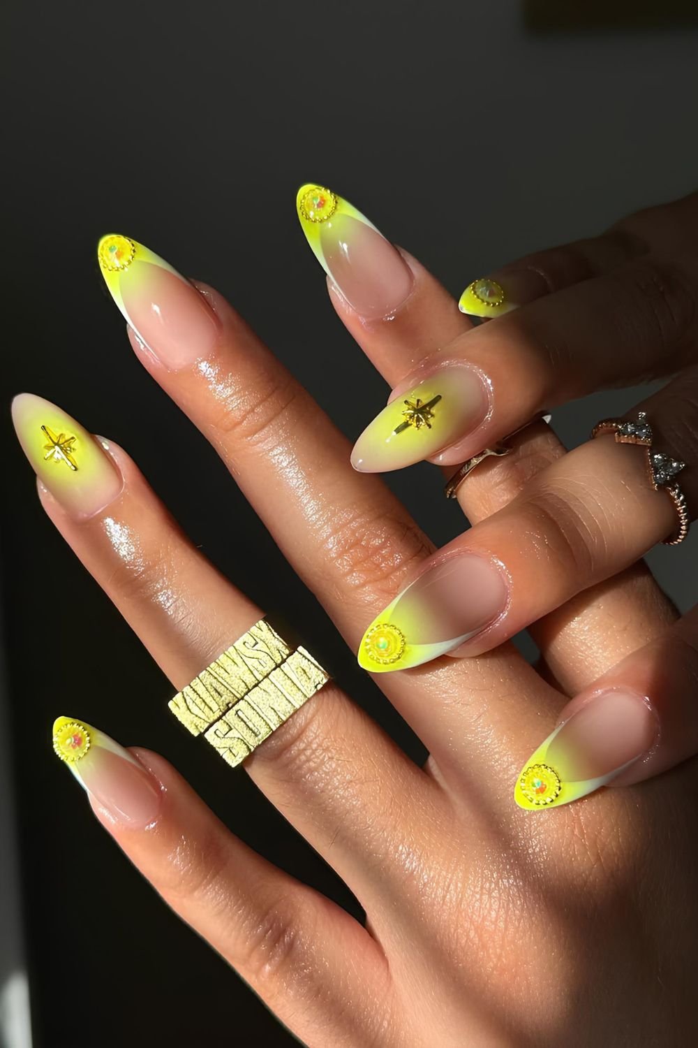 French mani with yellow aura and ombre effect and celestial motives