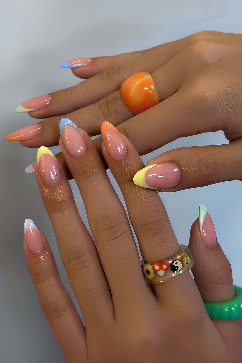French manicure in different bright colors