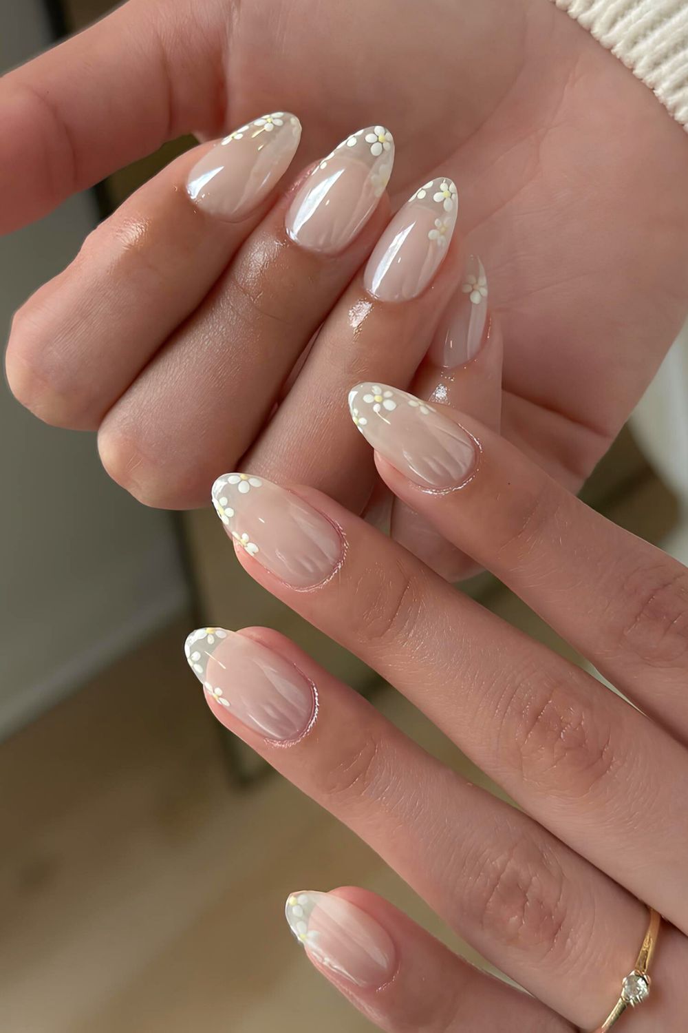 Glazed white mani with jelly finish and white floral tips