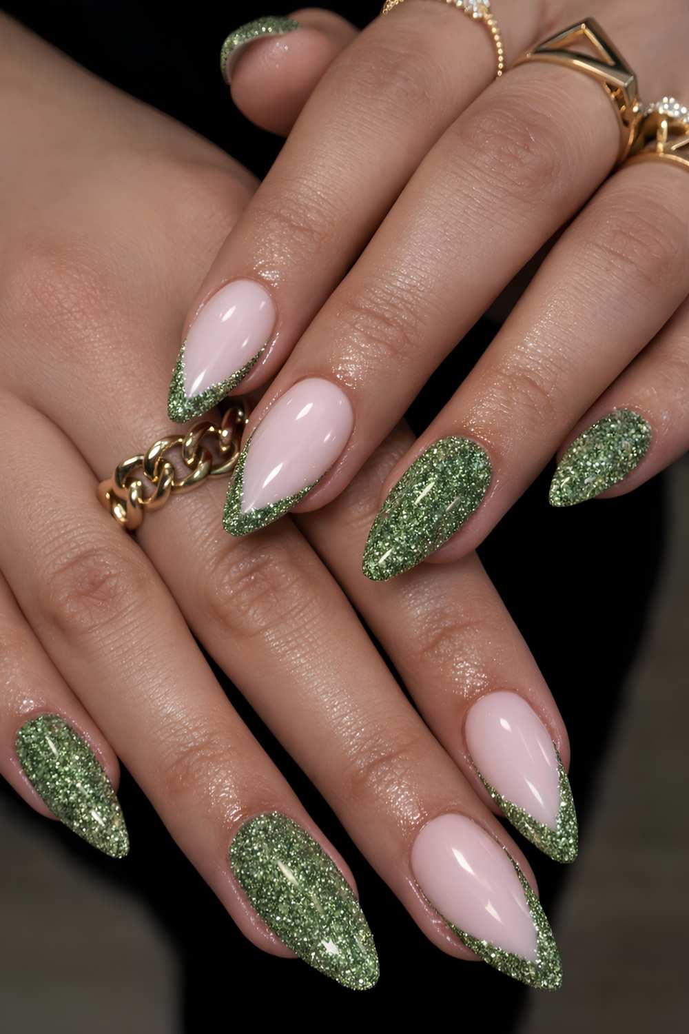 Glittery green nails with accent French tips