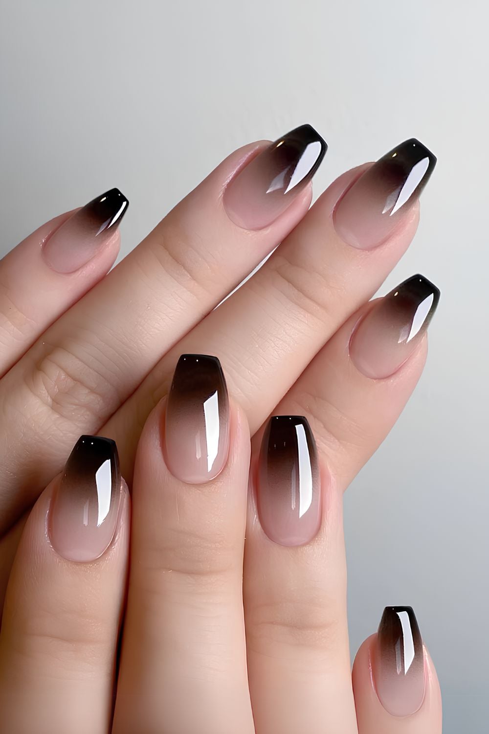 Glossy black ombre manicure