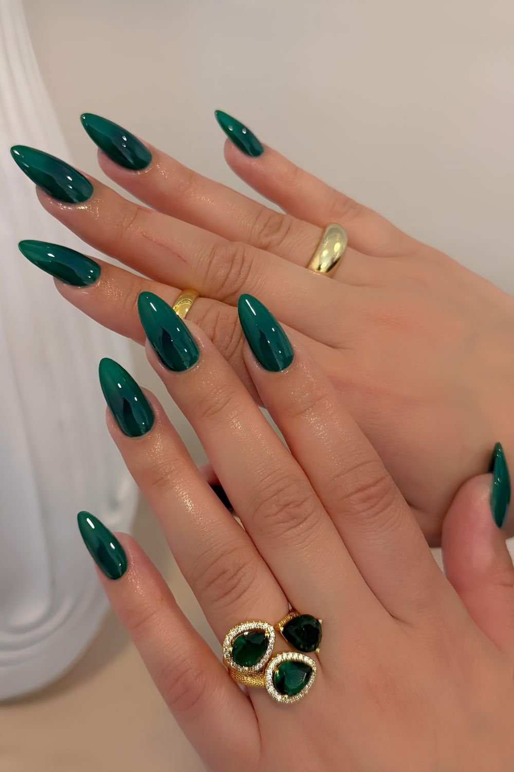 Glossy emerald green nails