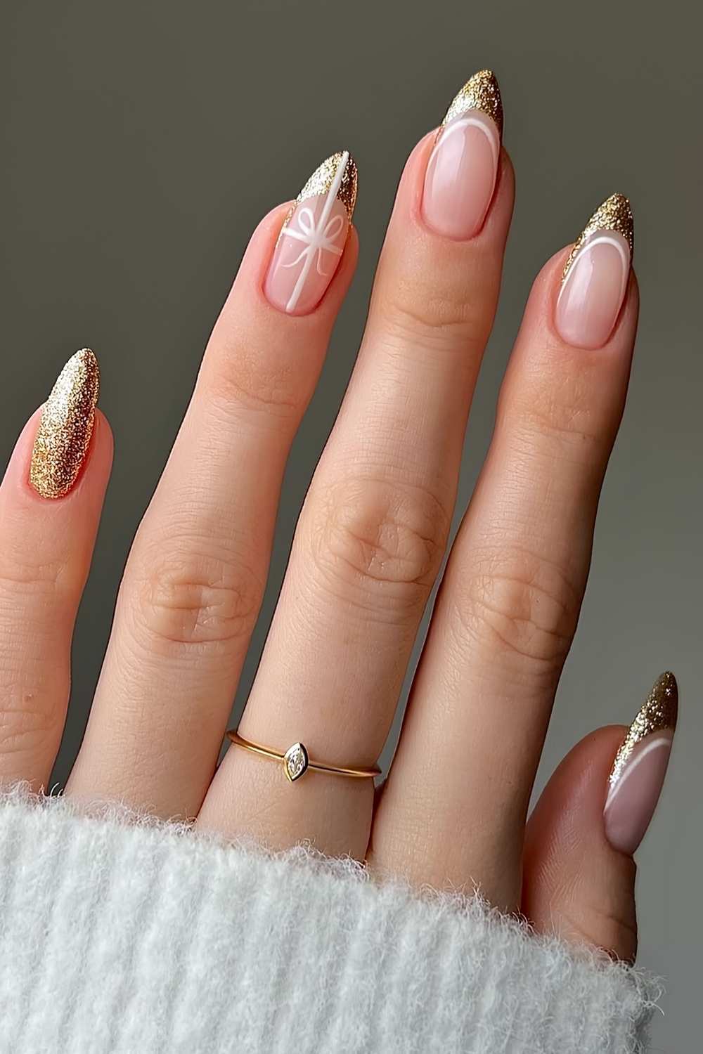Gold French mani with accent Christmas bows