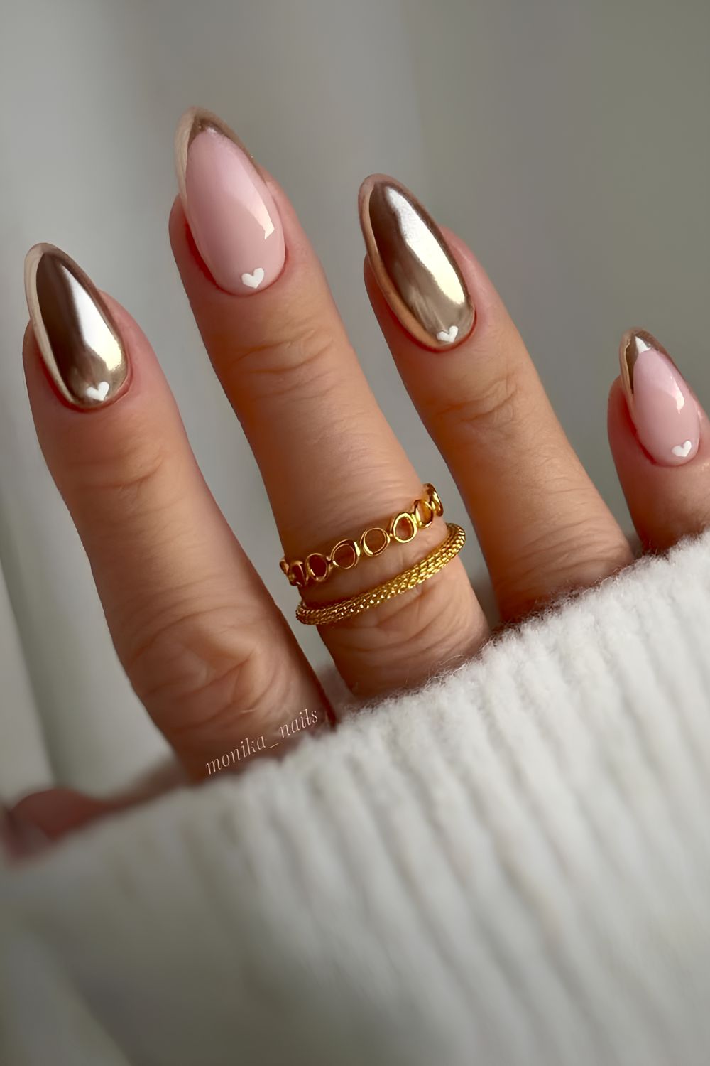 Gold chrome nails with white hearts