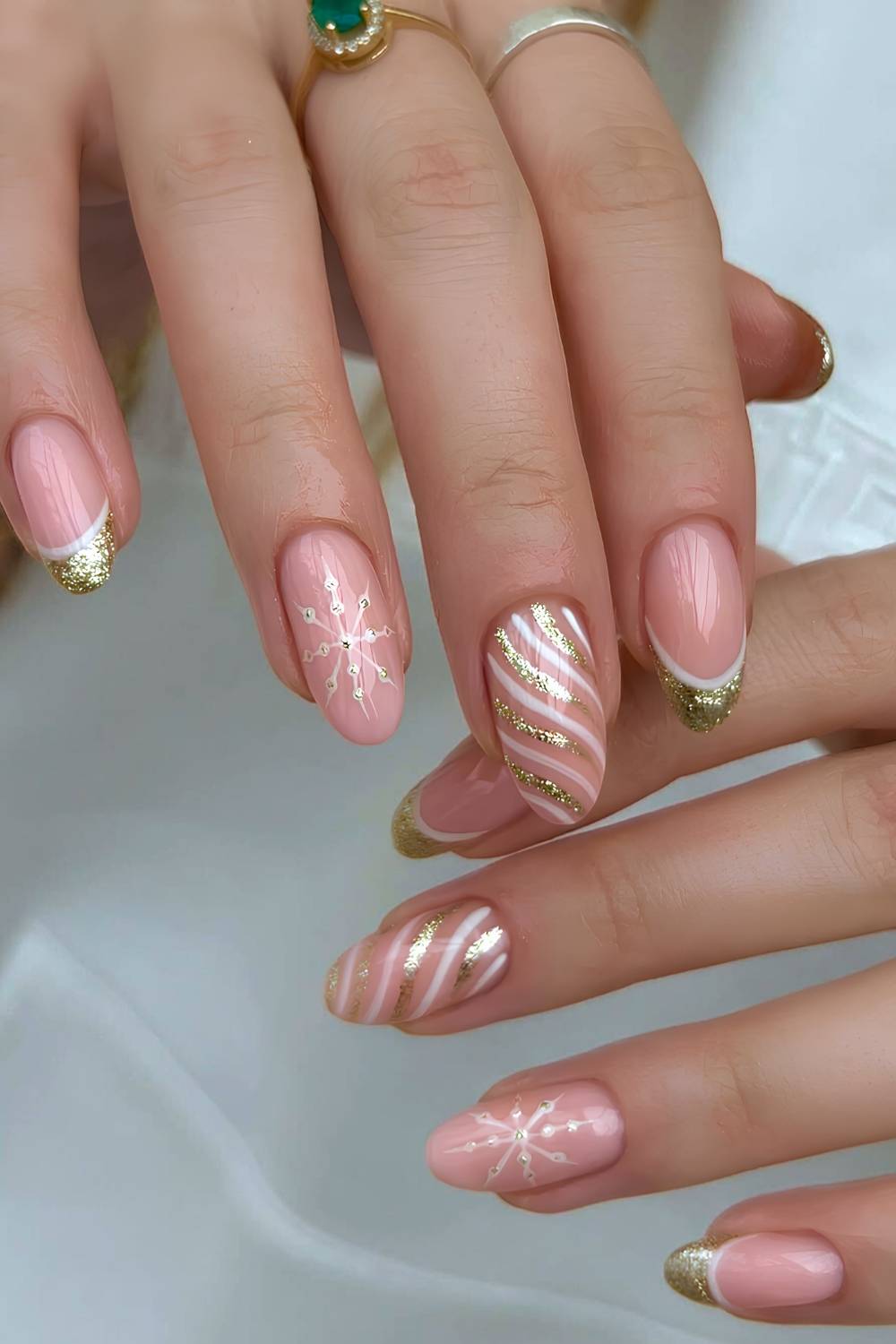 Gold glitter Christmas French nails with snowflakes