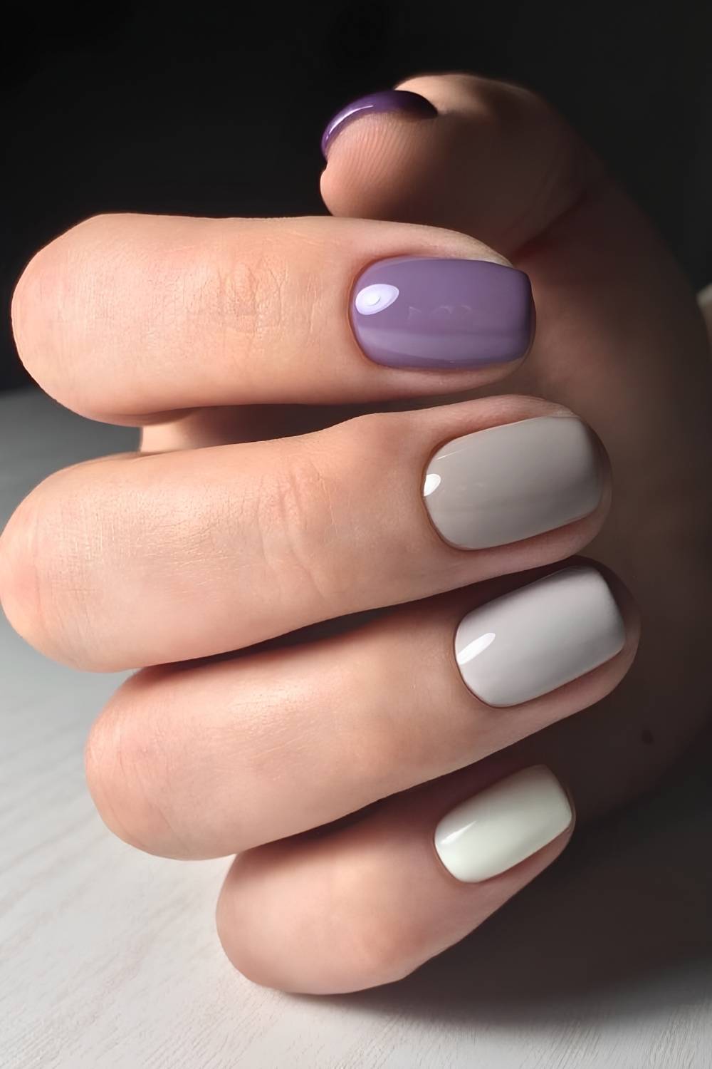 Gray and purple skittle mani
