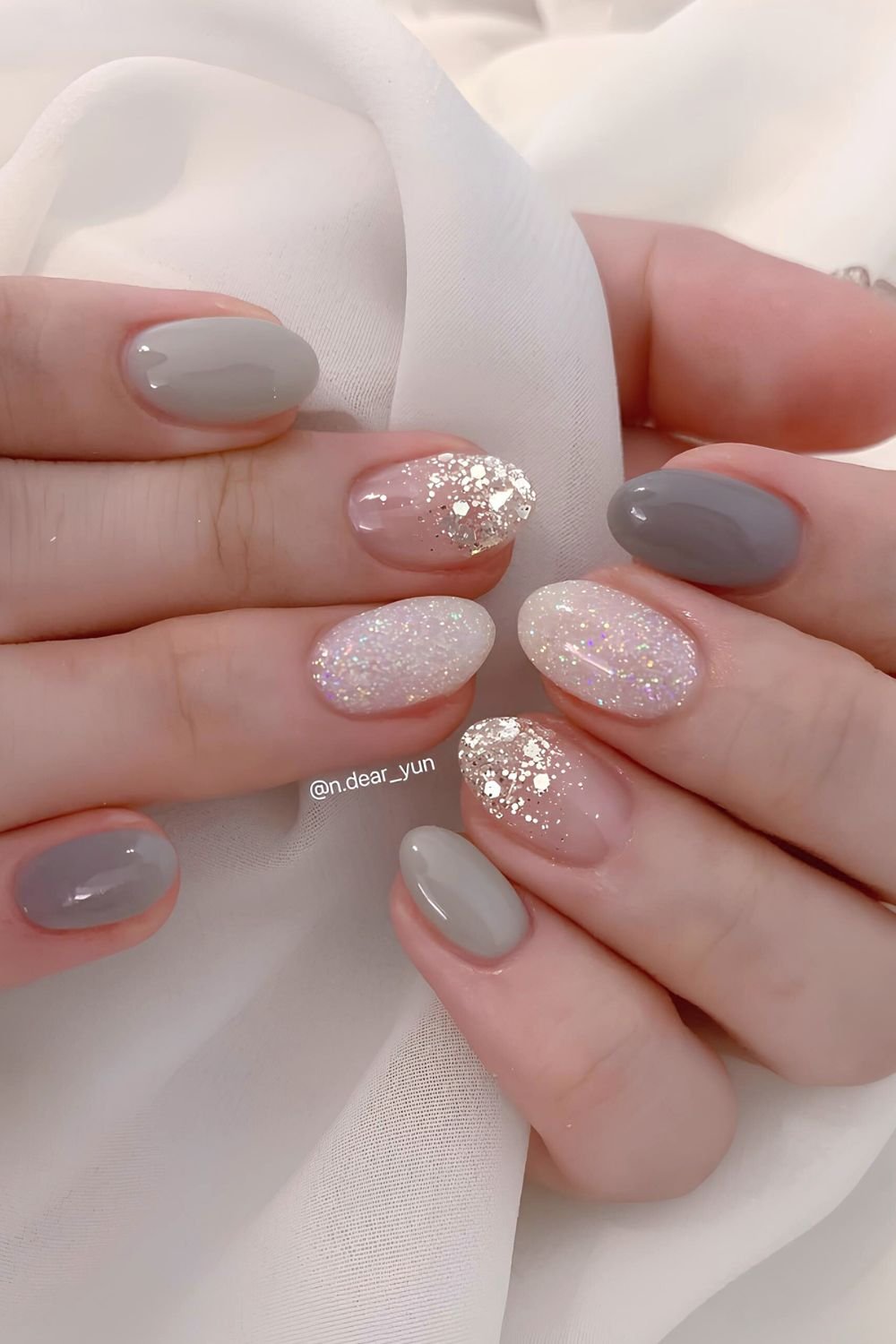 Gray mani with glitter accent nails