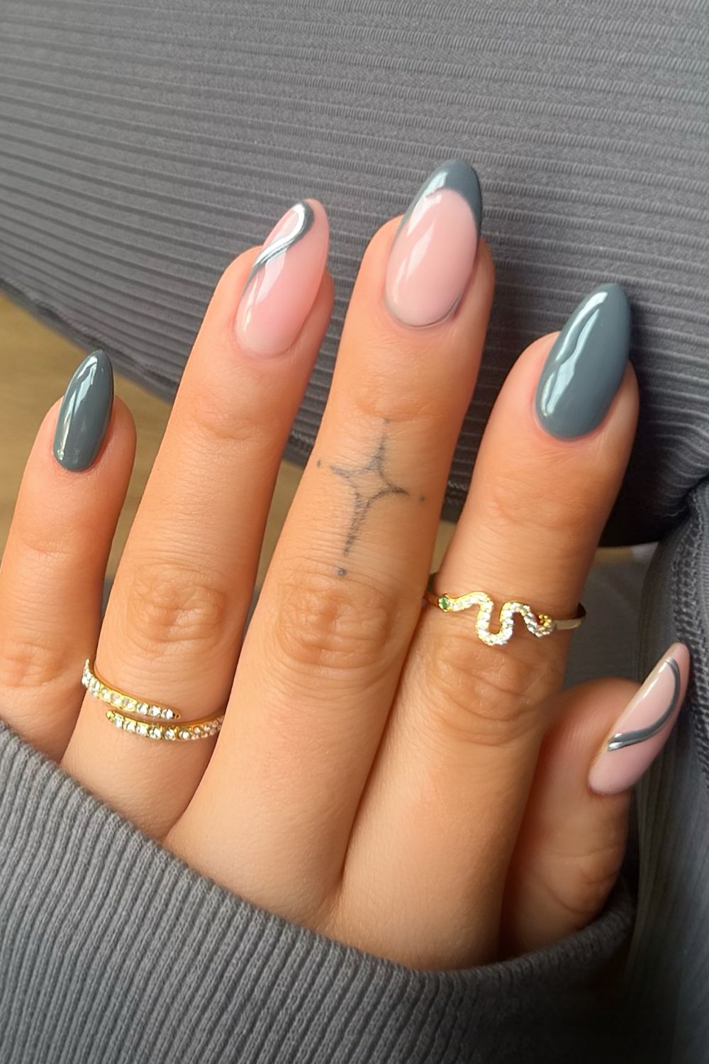 Gray nails with swirl details
