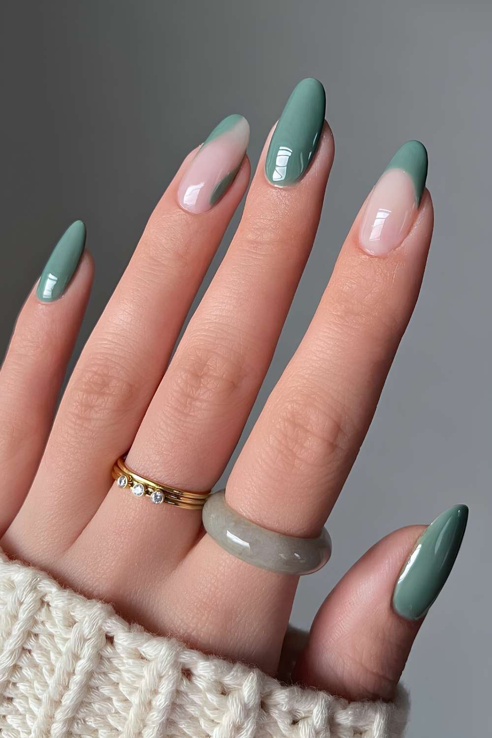 Green almond nails with negative space design