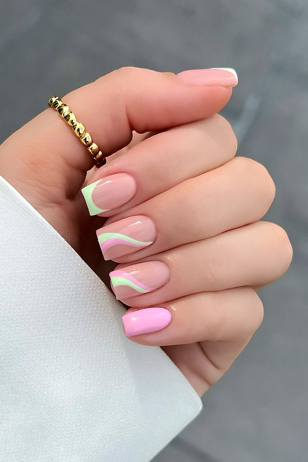 Green and pink mani with accent swirls