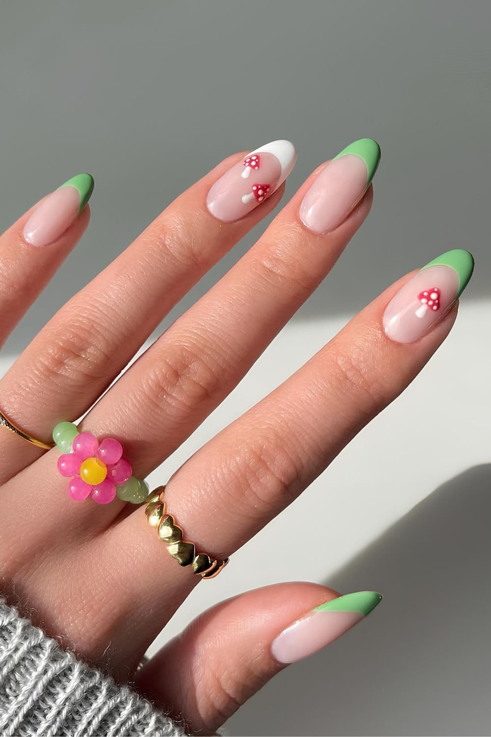 Green and white French nails with mushrooms