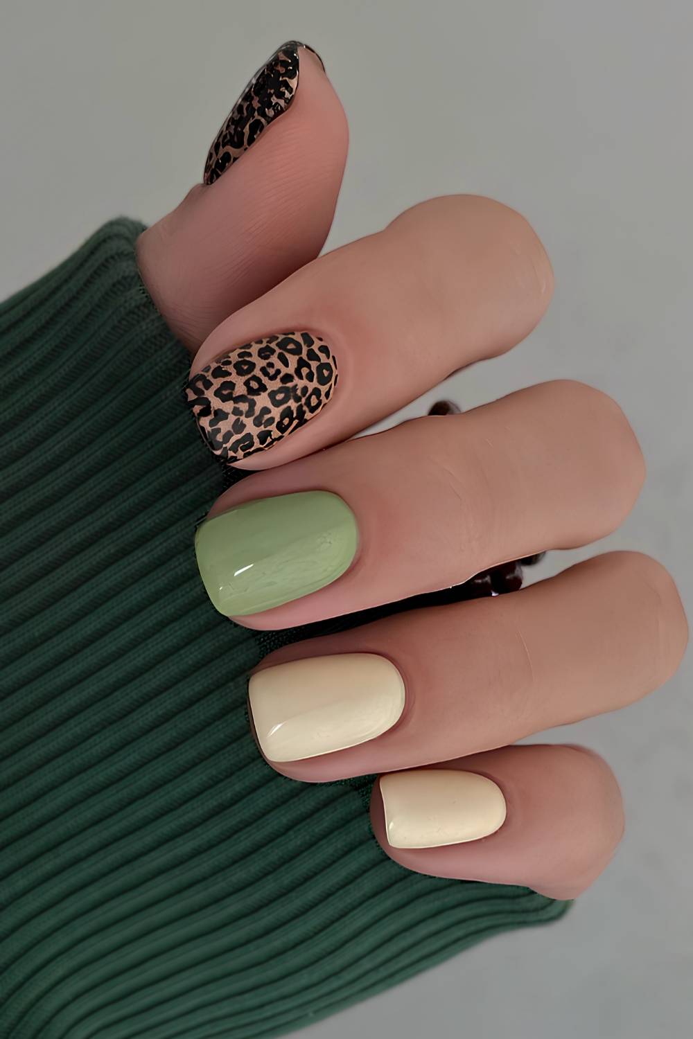 Green and yellow nails with cheetah print