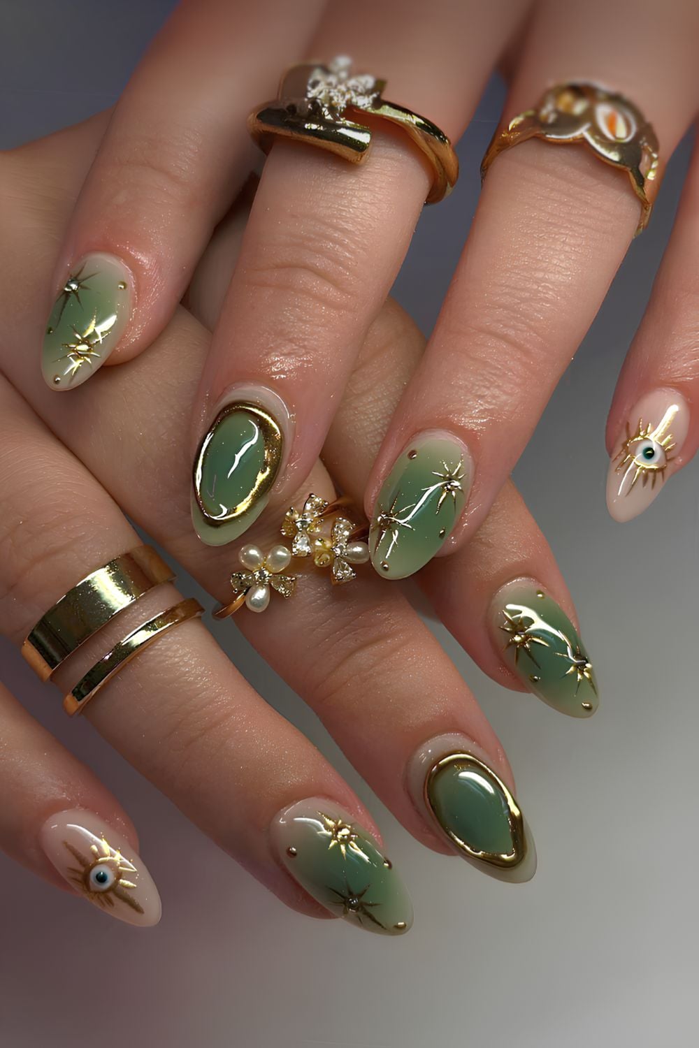 Green aura mani with gold chrome details