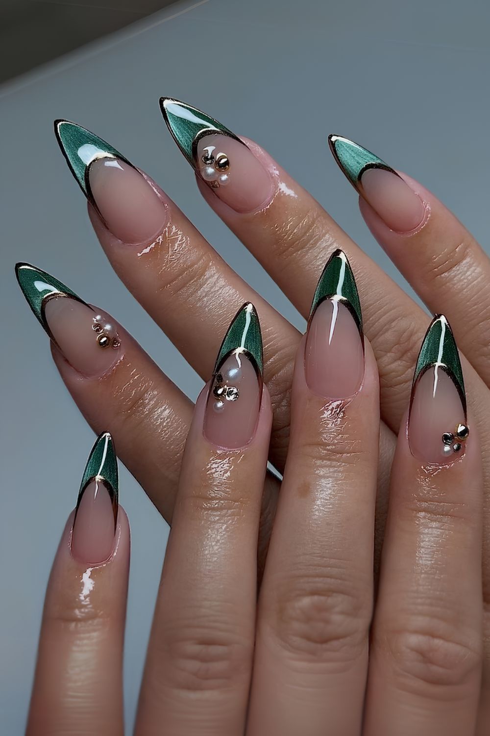 Green cat-eye French nails with pearls