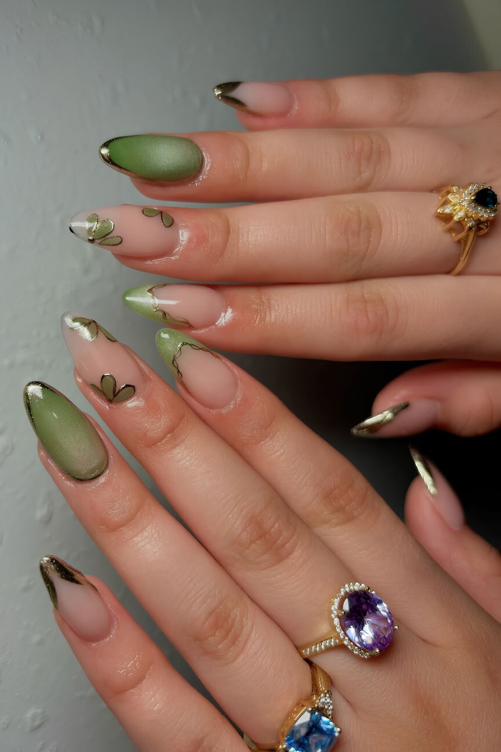 Green cat eye nails with floral art