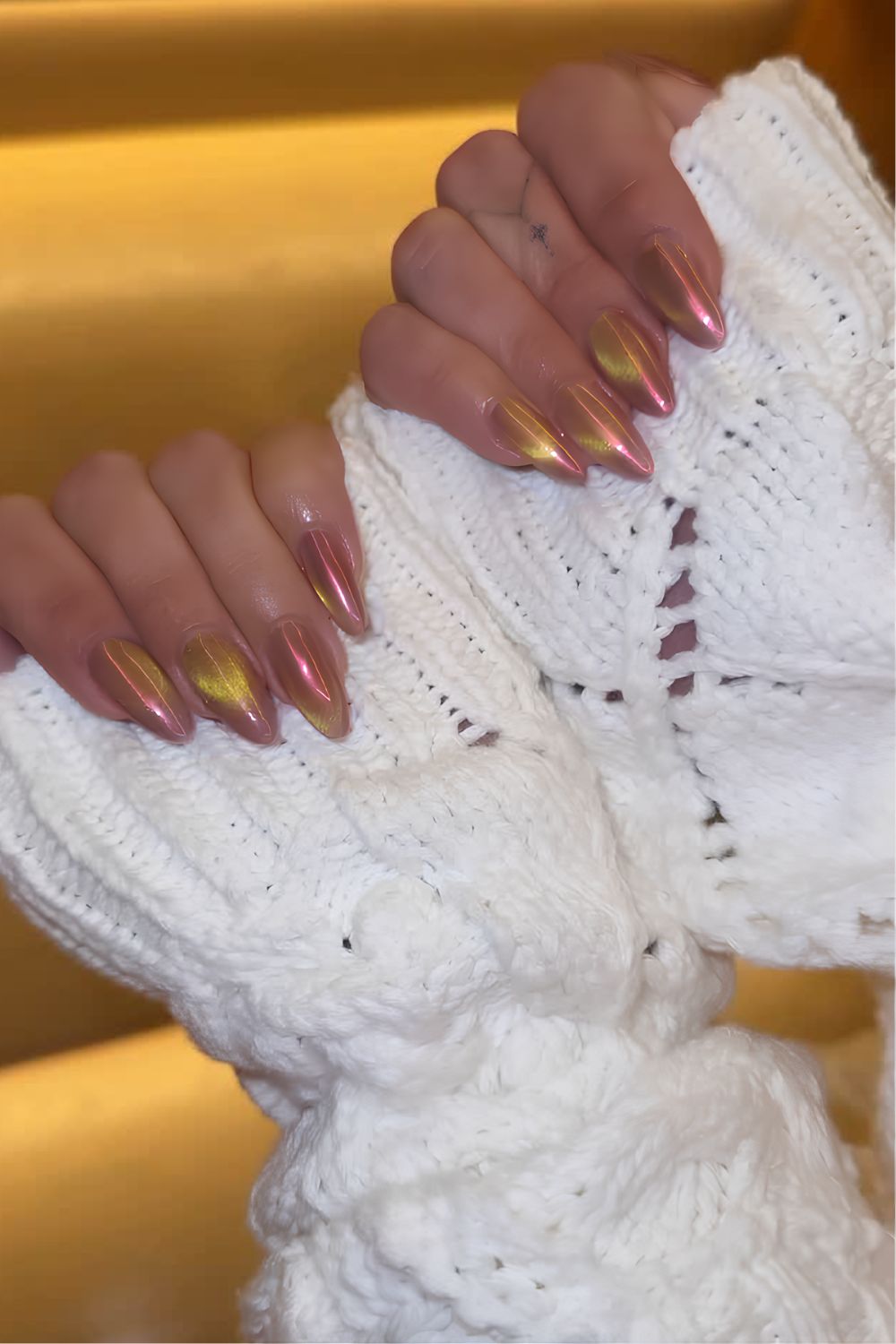 Guava glaze manicure with cat-eye effect