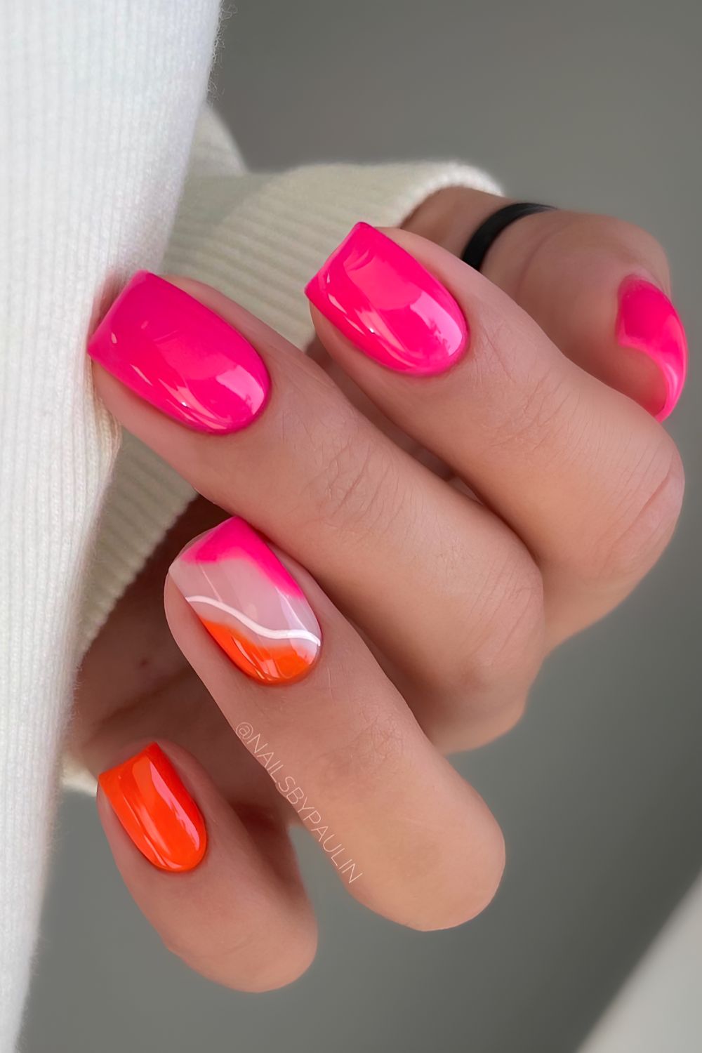 Hot pink and orange mani with line art