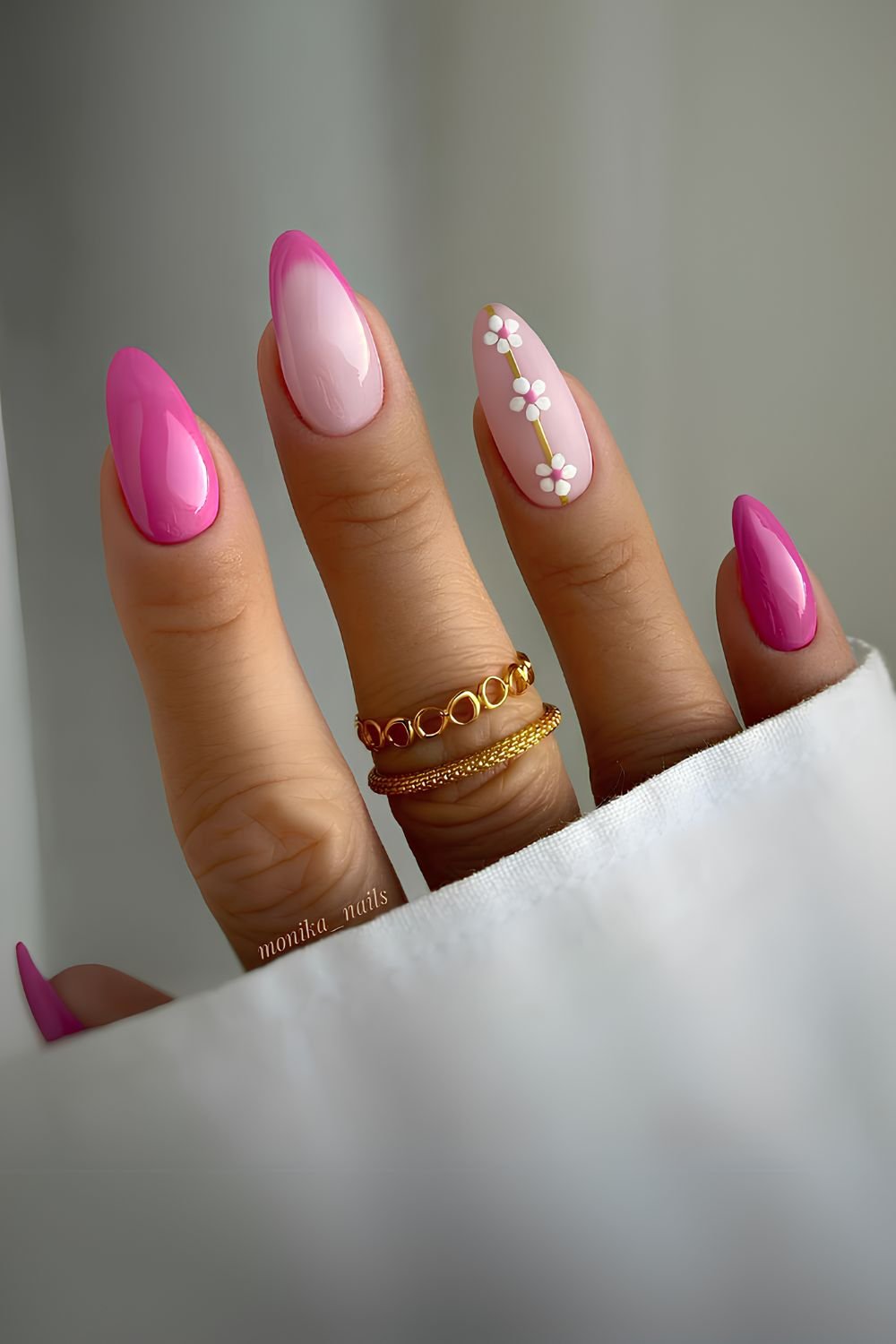 Hot pink nails with daisy art